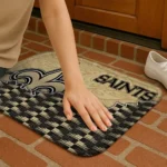 new-orleans-saints-tribal-detailing-gold-black-doormat-best-selling.webp