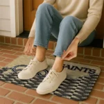 new-orleans-saints-tribal-detailing-gold-black-doormat-best-selling.webp