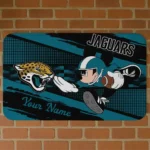 personalized-jacksonville-jaguars-mickey-quarterback-teal-black-doormat-best-selling.webp