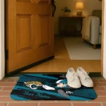 personalized-jacksonville-jaguars-mickey-quarterback-teal-black-doormat-best-selling.webp