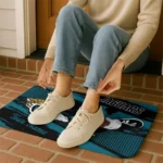 personalized-jacksonville-jaguars-mickey-quarterback-teal-black-doormat-best-selling.webp