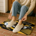personalized-pittsburgh-steelers-mickey-quarterback-gold-black-doormat-best-selling.webp