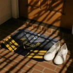 pittsburgh-steelers-chevron-points-gold-black-doormat-best-selling.webp