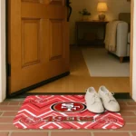 san-francisco-49ers-chevron-geometrics-red-doormat-best-selling.webp