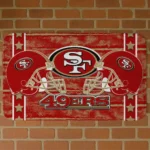 san-francisco-49ers-helmet-illustration-red-doormat-best-selling.webp