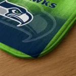 seattle-seahawks-pixel-blur-blue-doormat-best-selling.webp